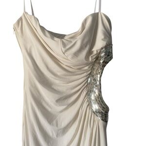 Elegant Cream Backless Dress with Silver Accents